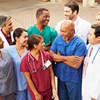 group of doctors standing smiling